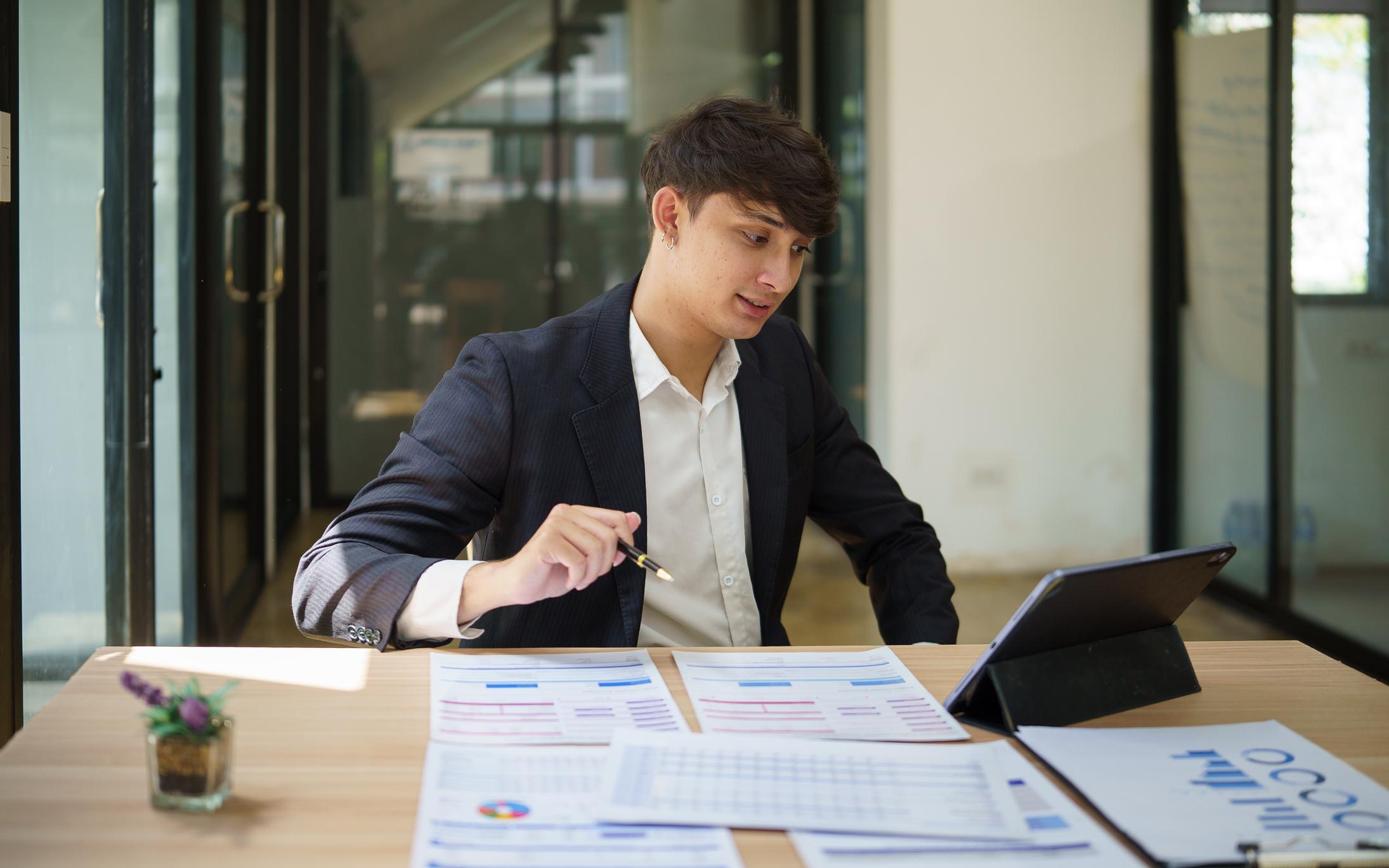 Professional reviewing wealth planning charts