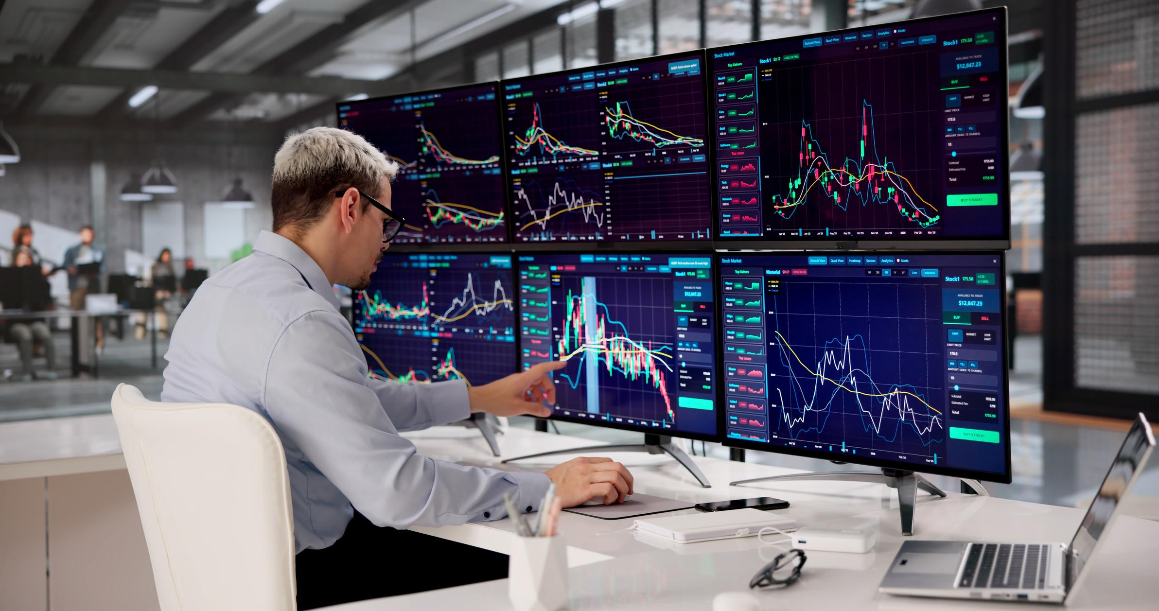 Investor analyzing portfolio performance on a tablet